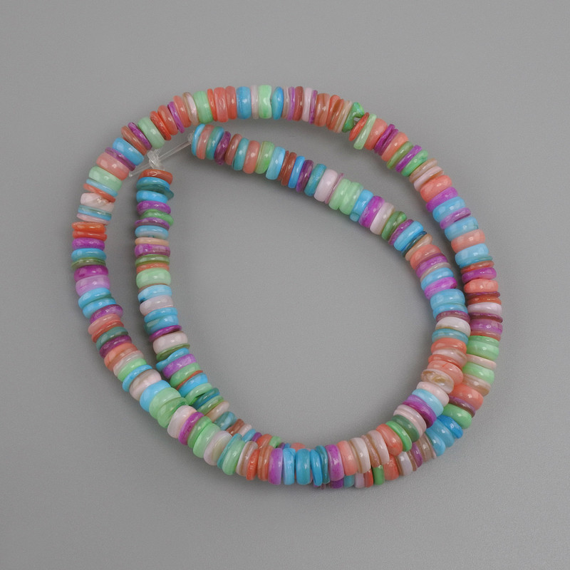 Scapharca shell rondelle beads, 6 mm diameter, 1–2 mm thick, 38 cm long on fishing line