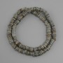 Skafarka shell rondelle beads, diameter 5–6×1.5–2 mm, length approximately 38 cm on beading thread