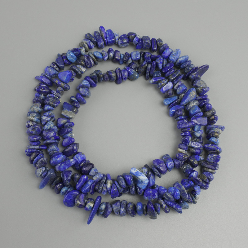 Lapis Lazuli Chip Beads, diameter 7-12×1.5 mm, length 76 mm ± on thread