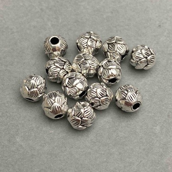 Bead-insert findings, silver metal color, 7 mm bead diameter, hole diameter ~2.2 mm, packaging 20 g ~19 pcs