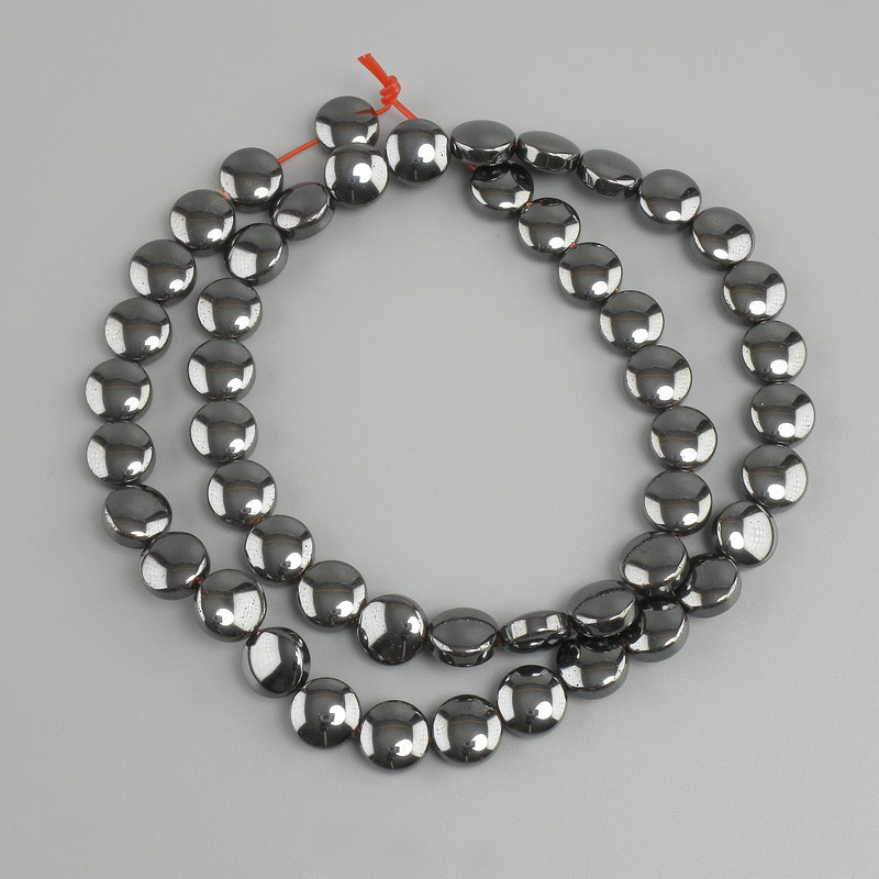 Hematite coin beads, 8 mm diameter, approximately 41 cm long, on beading wire