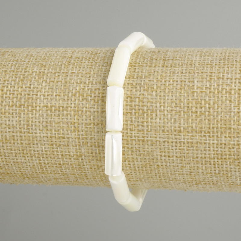 Bracelet with Mother-of-Pearl Cylinders, diameter 15×6 mm, length 18 cm ± stretch