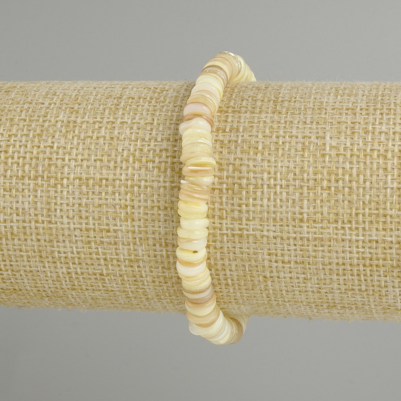 Bracelet with Skafarka shell rondelle, diameter 6×1.5-2 mm, length 18 cm ± stretch