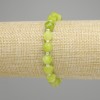 Peridot Bracelet Faceted Diamond-Shape Olivine, 7-8x7-7 mm diamond facets, 5 mm+- seed beads, length 18 cm+- stretch