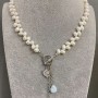 Necklace of river pearls, oval shape with butterfly pendant, diameter 6.5–7.5×4.5–5mm ±, with additional pendants, length 50 cm + toggle
