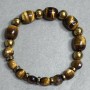 Tiger's Eye Bracelet Barrels 12x10mm+-, Hematite Bead 7mm+-, coin 8mm+-, length 18cm +-, stretch