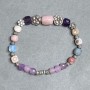 Bracelet Mountain Crystal tumbled 16×13 mm ± 4–7×6 mm ±, length 18 cm ± stretch