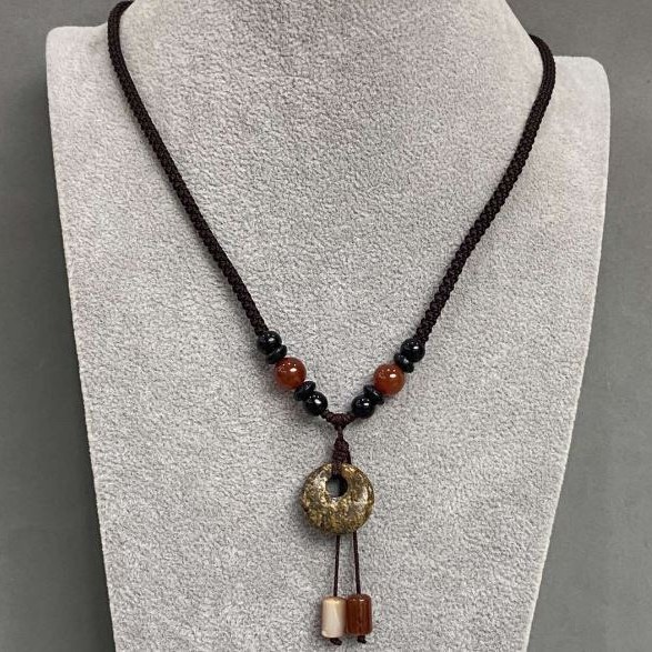 Pendant "Bagel" Jasper on a cord with Agate and Carnelian beads, length 65 cm