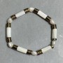 Pearl bracelet 7-9x7-8 mm hematite rondelle 6 mm+/- mother-of-pearl cylinder 13x6 mm+/- length 18 cm stretch