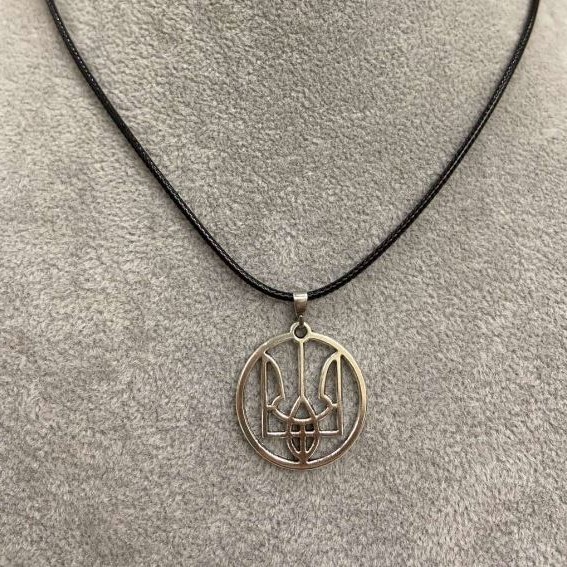 Pendant 'Trident in a circle' in collar, diameter 25 mm ± silvery metal on eco-leather cord, length 60 cm +5 cm chain