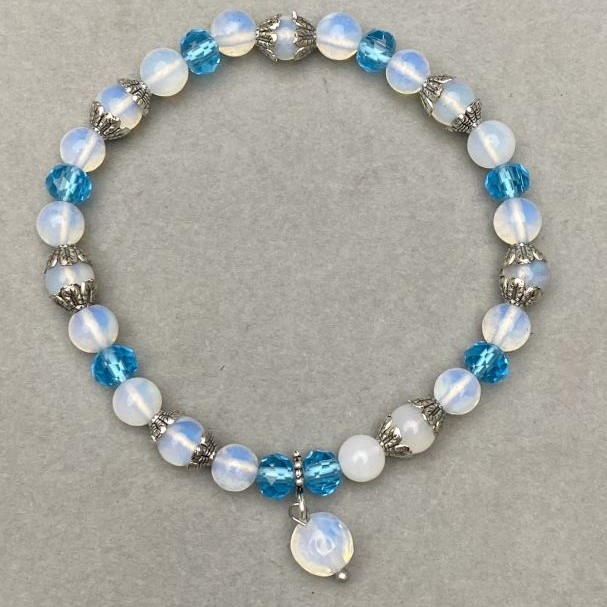 Bracelet Opalite smooth round bead 6mm± Czech crystal 6x5mm±, length 18cm± stretch