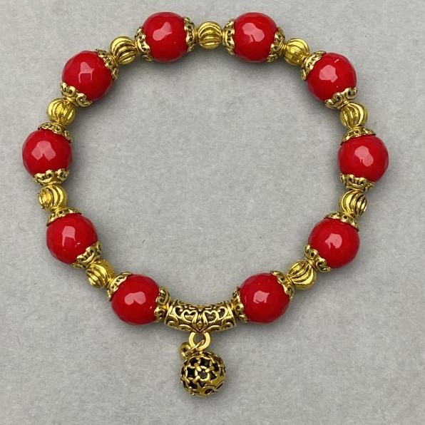 Bracelet Coral faceted bead 8 mm+- with inserts, length 18 cm+- stretch