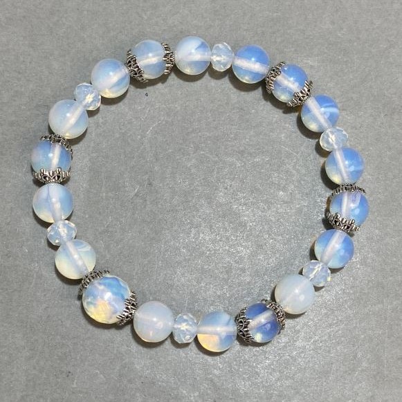 Opalite bracelet, round bead 8mm+- faceted rondelle 6x5mm+-, with inserts, length 18cm+- stretch