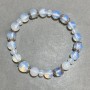 Opalite bracelet, round bead 8mm+- faceted rondelle 6x5mm+-, with inserts, length 18cm+- stretch