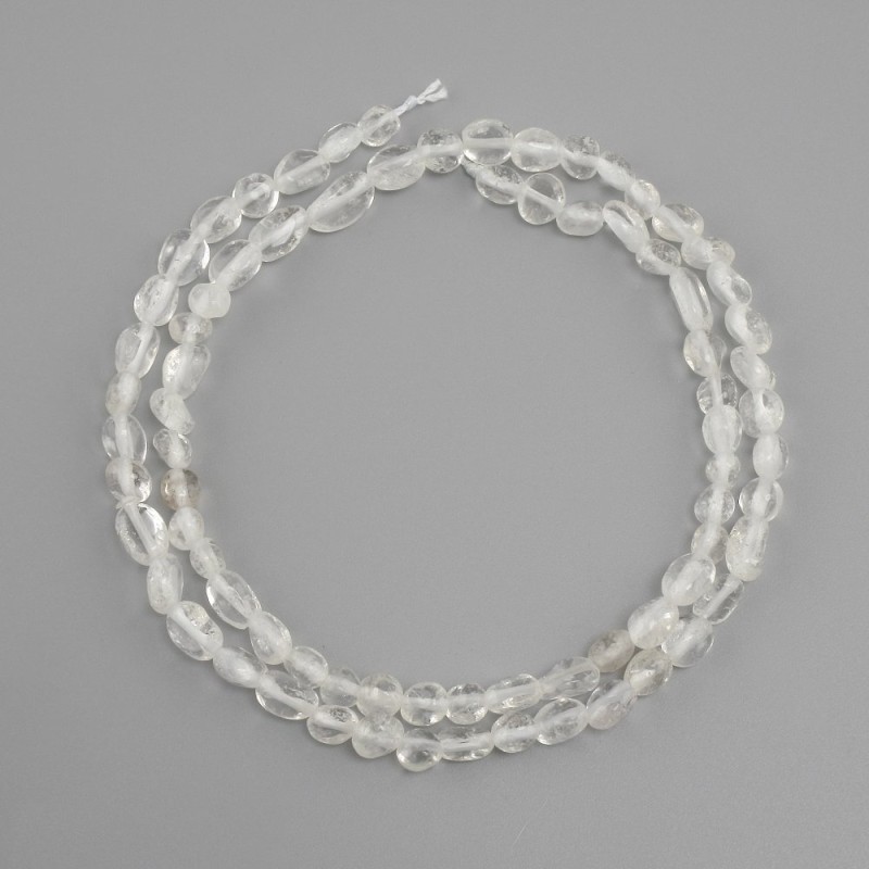 Beads Rock Crystal tumbled, diameter 5-7x4-5mm ±, length 39cm ±