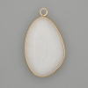 White quartz pendant in a gold-colored metal setting 32x22mm+