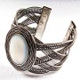 Wide pearl bracelet with metal bezel, oval setting
