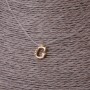 Pendant, 9 mm diameter on invisible silicone cord, length 39–44 cm