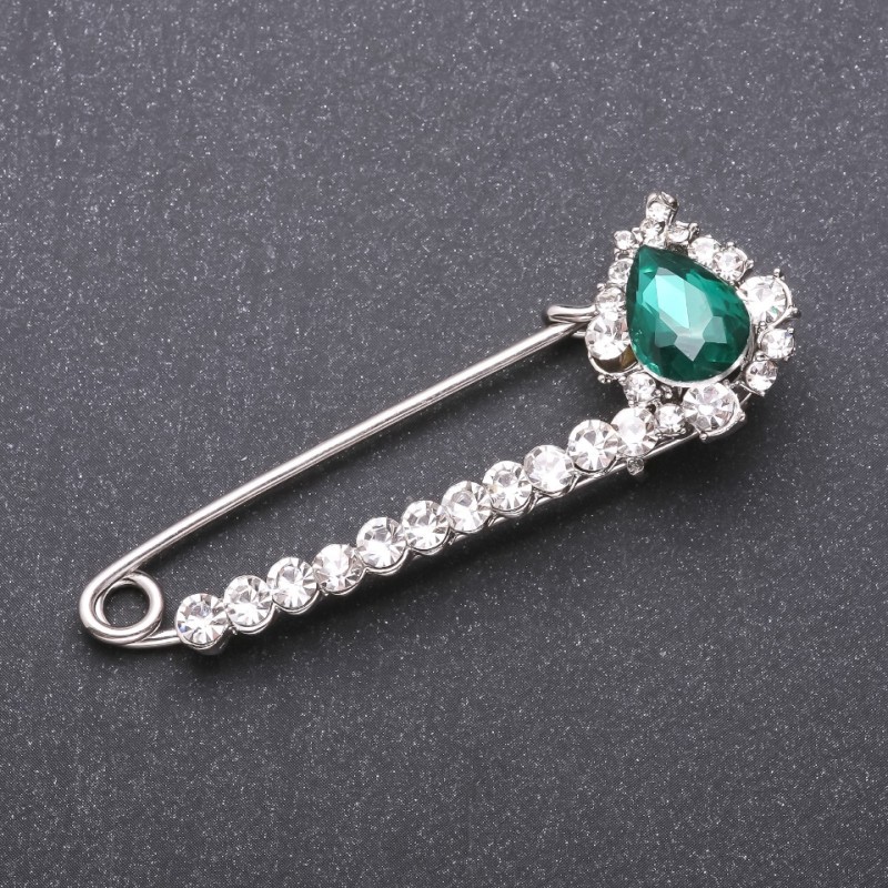 Brooch pin with green glass crystals, 64×22 mm, white metal