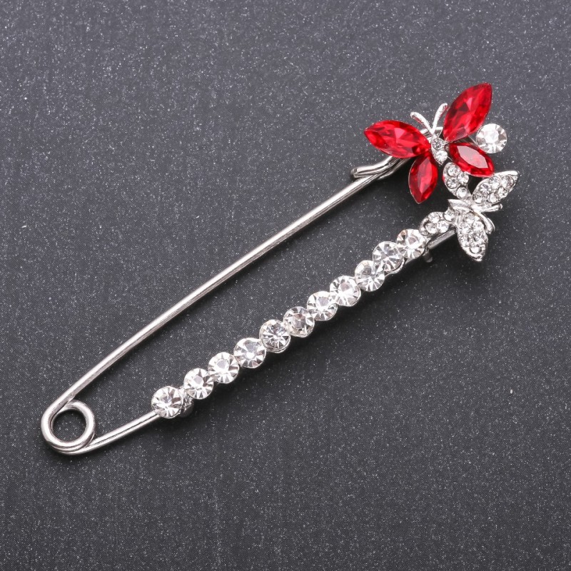 Brooch with red glass crystals