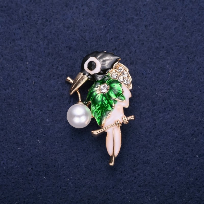 Sale! Bird-shaped brooch with enamel and rhinestones, black, white, and green, 37×24 mm, gold-tone metal