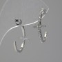 Hoop-style stud earrings with a cross-shaped design, encrusted with crystals / silver-plated metal / 35 × 12 mm