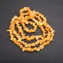 Beads on fishing line, tinted quartz chips, 6 mm diameter, 80 cm length