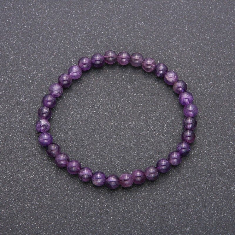 Bracelet made of natural amethyst on elastic cord, smooth bead, diameter 6 mm (±), circumference 18 cm