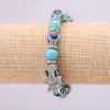 Turquoise Obereg Bracelet (synthetic) with blue Eyes on elastic, diameter 10(+-)mm, length 18 cm with inserts and Starfish pendant