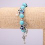 Bracelet-amulet Turquoise (single ) with blue 'little eyes' on an elastic cord, diameter 10 (+- ) mm, length 18 cm with inserts and pendants