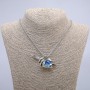Pendant 'Hand-Candle Dragon Eye' 60x30 mm on a chain, length 70 cm +/- silver-toned metal