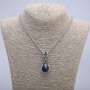 Pendant 'Paw with Sphere' 45x20 mm on a chain, length 70 cm, silver-colored metal