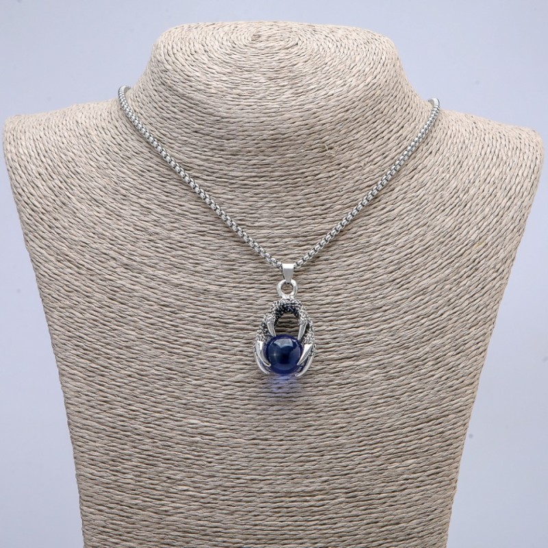 Pendant 'Ball in the Paw' 42×22 mm on a chain, length 70 cm +/- silver-colored metal