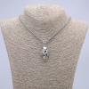 Skull pendant 37×15 mm on a chain, 65 cm length, silver-colored metal