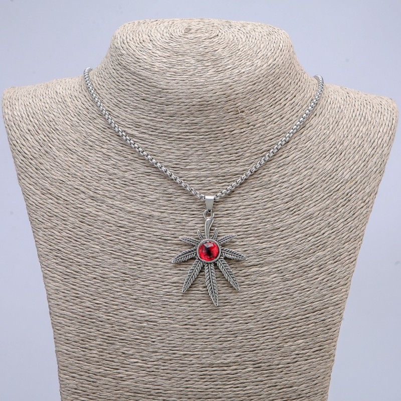 Pendant 'Cannabis Leaf with Dragon's Eye' 38x55mm on a chain, 65 cm long, silver-colored metal