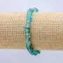 Elastic bracelet with tinted rock crystal granules, diameter 7x3 mm