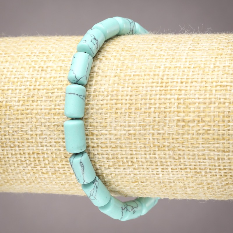 Bracelet on elastic with artificial turquoise (single) smooth cylindrical beads, diameter 10x6mm+