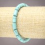 Bracelet on elastic with artificial turquoise (single) smooth cylindrical beads, diameter 10x6mm+