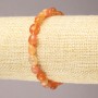 Elastic bracelet of natural carnelian, faceted, 9×7 mm diameter