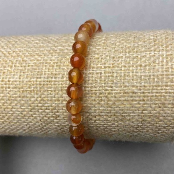 Carnelian bracelet — smooth beads, 6 mm diameter ± (stretch)