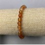 Carnelian bracelet — smooth beads, 6 mm diameter ± (stretch)
