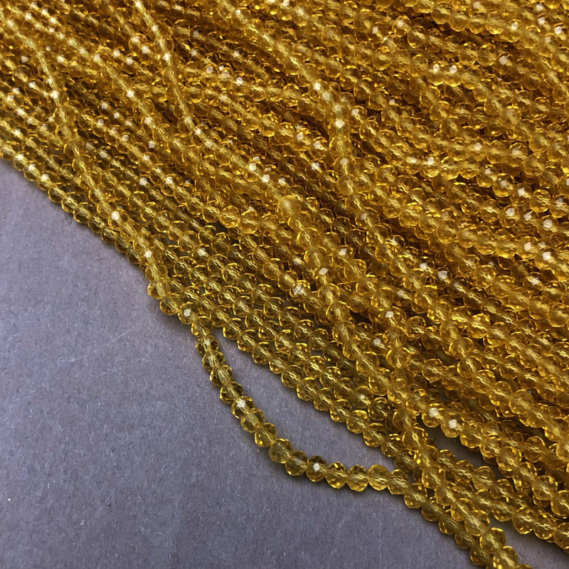 Beads Czech Crystal on fishing line light-yellow honey transparent faceted rondelle, diameter 3.5x3 mm, length 36-38 cm +