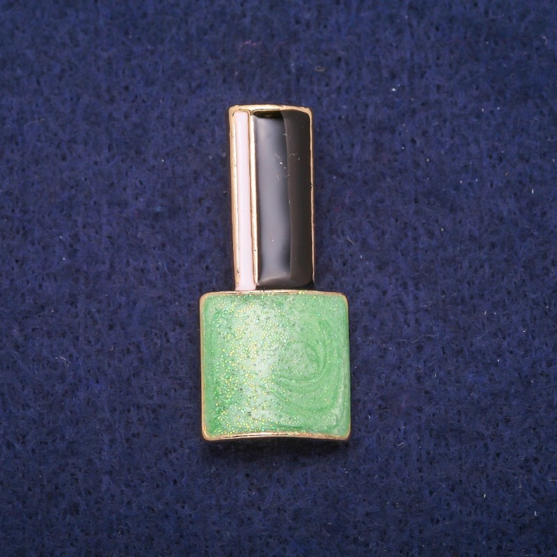 Brooch 'Lac' green, black and white enamel on gold-tone metal 18x39mm