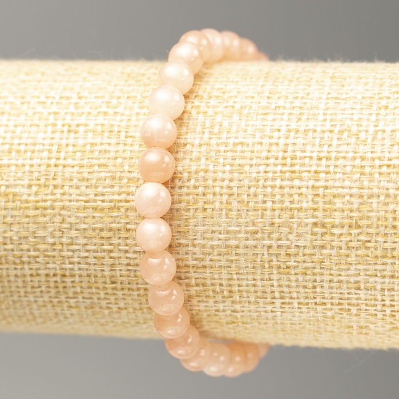Stretch bracelet with smooth beads that imitate selenite, 6 mm diameter, 18 cm length