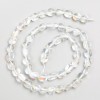 Beads on a thread of opal glass, tumbled, 6×7 mm, length 40 cm