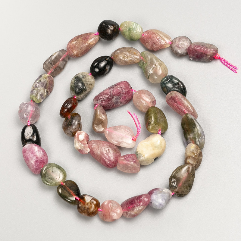 Beads of natural tourmaline — faceted, on thread, diameter 8x7 mm ±, length 41 cm ±
