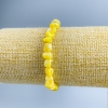 Yellow mother-of-pearl bracelet, faceted beads, diameter 8×6 mm +/-, length 18 cm (stretch)