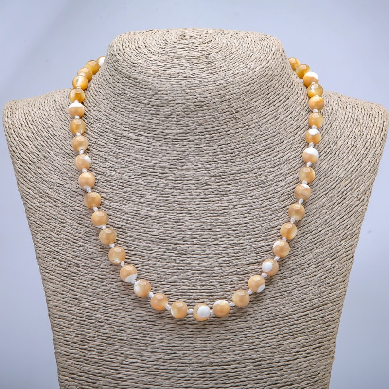Necklace made from natural beige mother-of-pearl — smooth bead, about 8 mm in diameter, length 45 cm