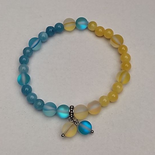 Bracelet Citrine and Aquamarine (synthetic acrylic), bead diameter 6.5 mm, length 18 cm (stretch) with opal glass inserts, 8 mm diameter