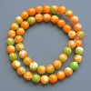 Variscite Beads (synthetic acrylic) green, orange, and white smooth round beads, 8.5 mm diameter, 39 cm length on beading thread
